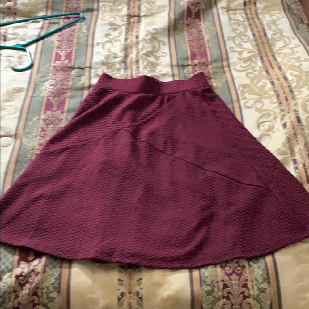 Flare skirt sits above the knee